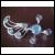 Vintage ~ Light Blue Glass Rhinestone Deco Type Swirl Pin
